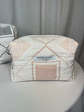 Pochette à maquillage rose pale