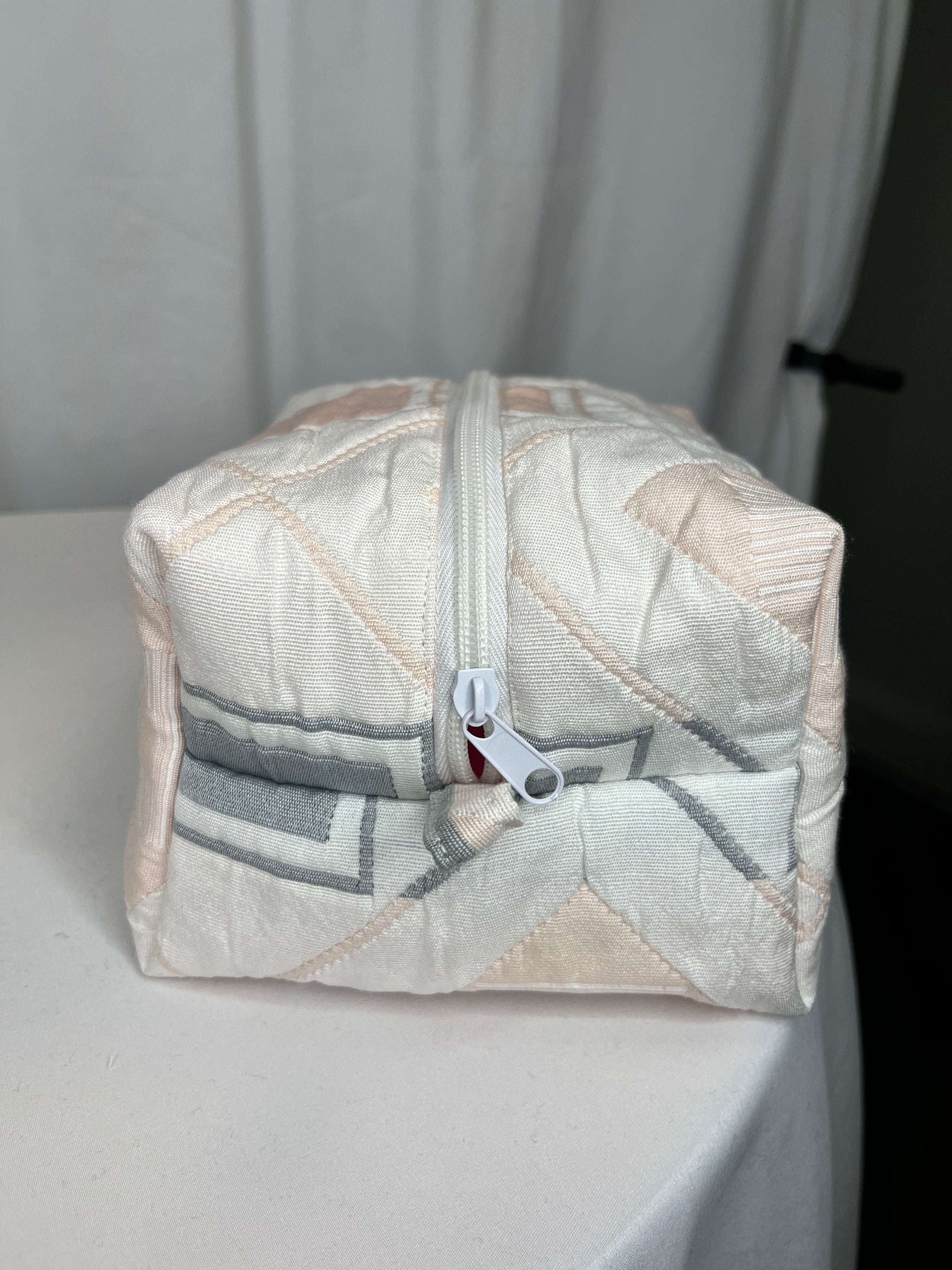 Pochette à maquillage rose pale