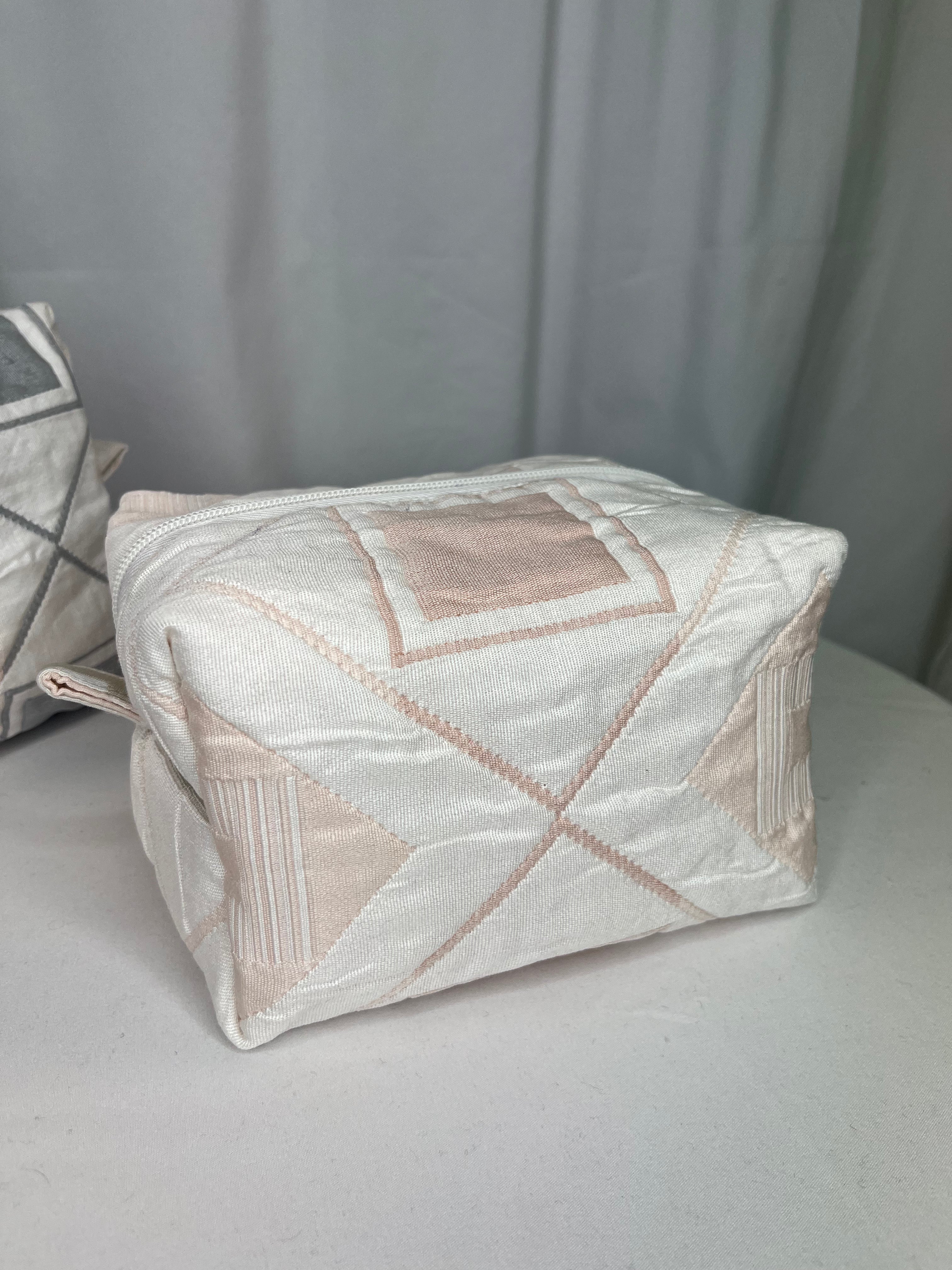 Pochette à maquillage rose pale