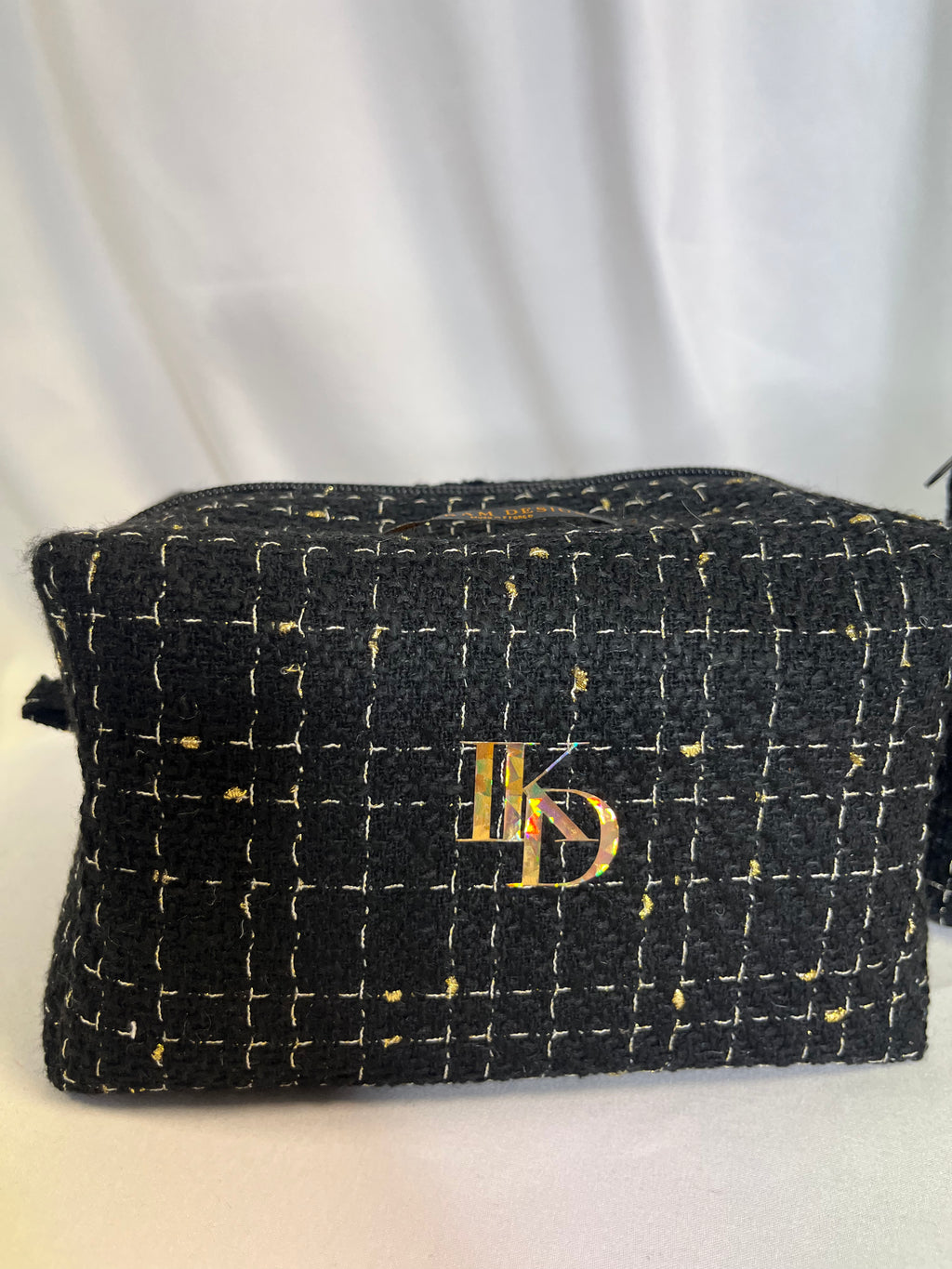 Pochette en tweed noir paillé doré