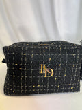 Pochette en tweed noir paillé doré