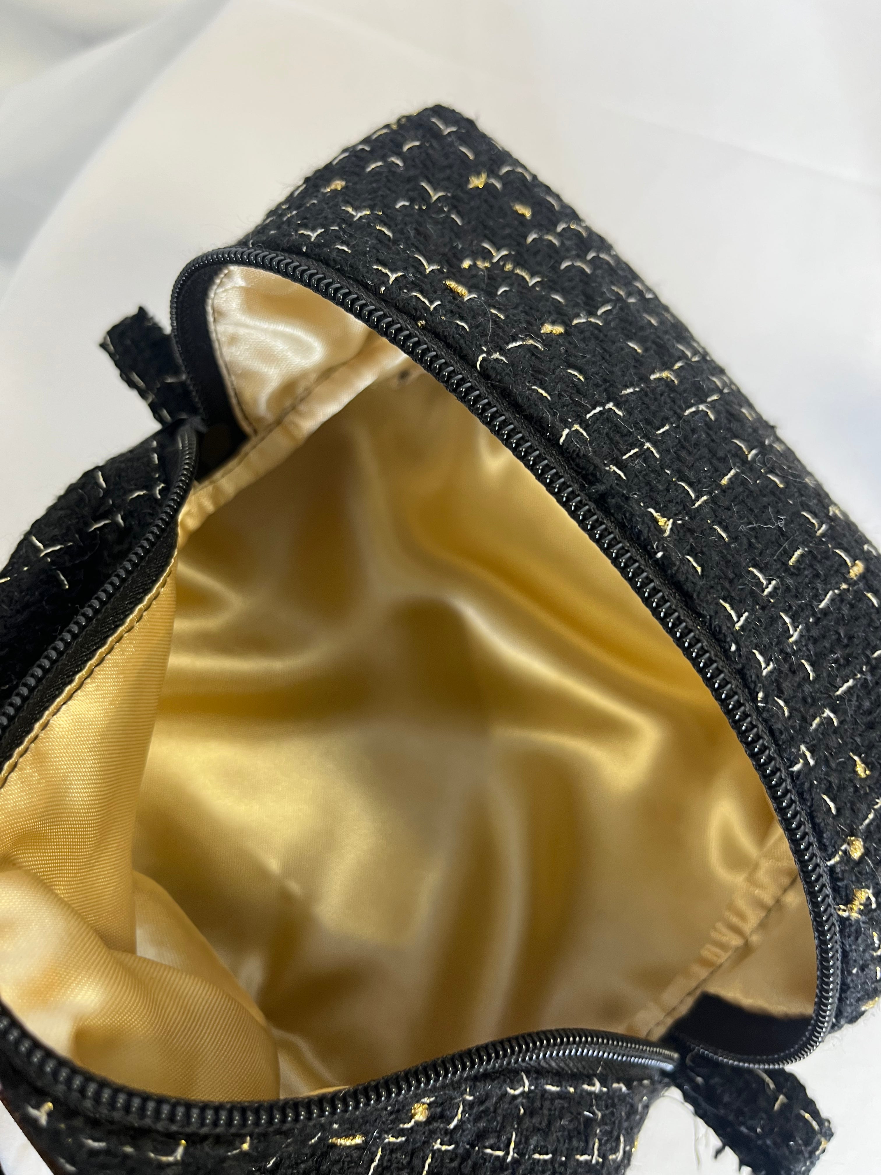 Pochette en tweed noir paillé doré