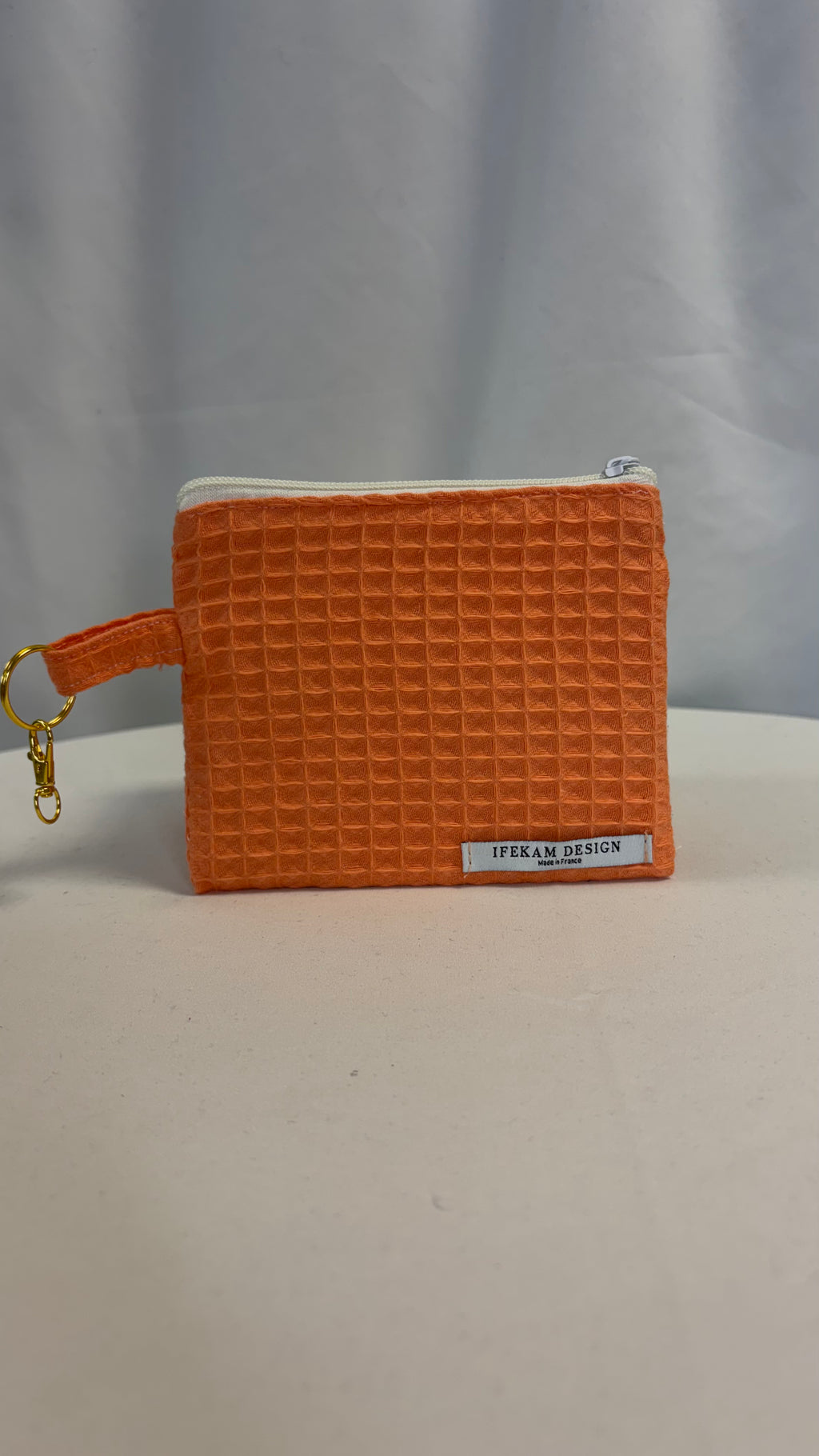 Moyenne pochette nid d’abeille uni papaye