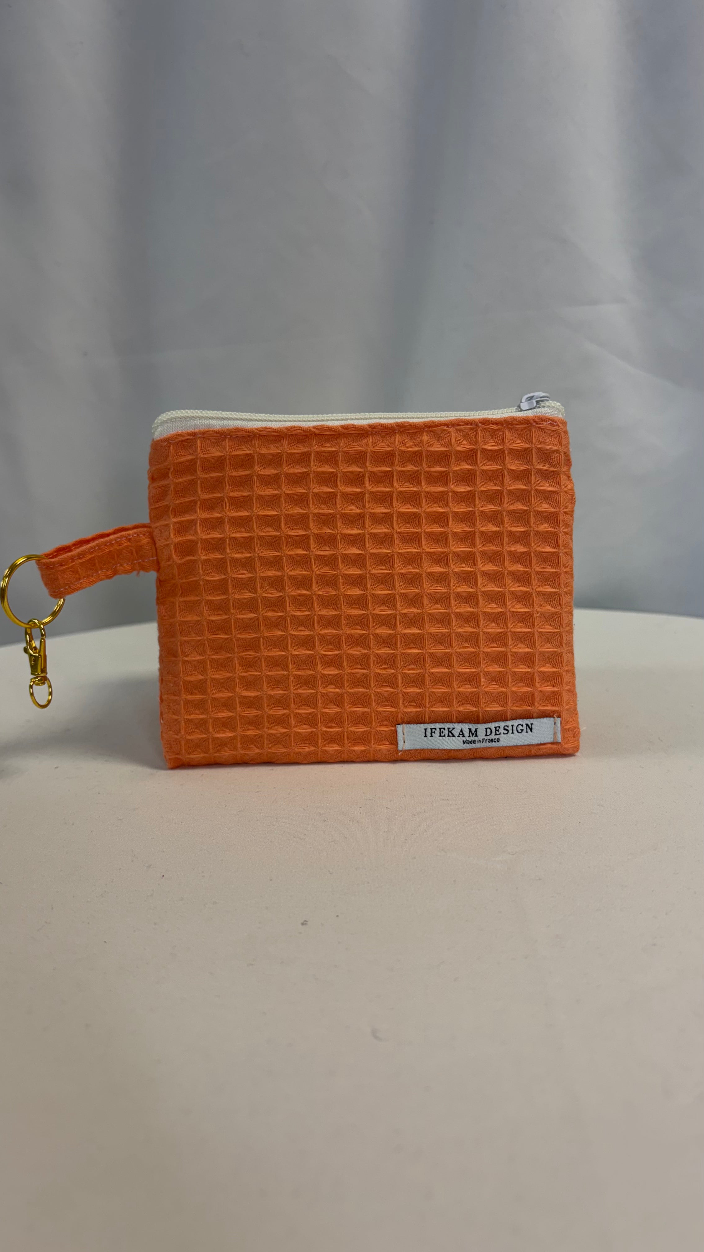 Moyenne pochette nid d’abeille uni papaye
