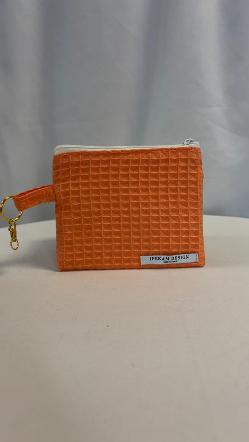Moyenne pochette nid d’abeille uni papaye